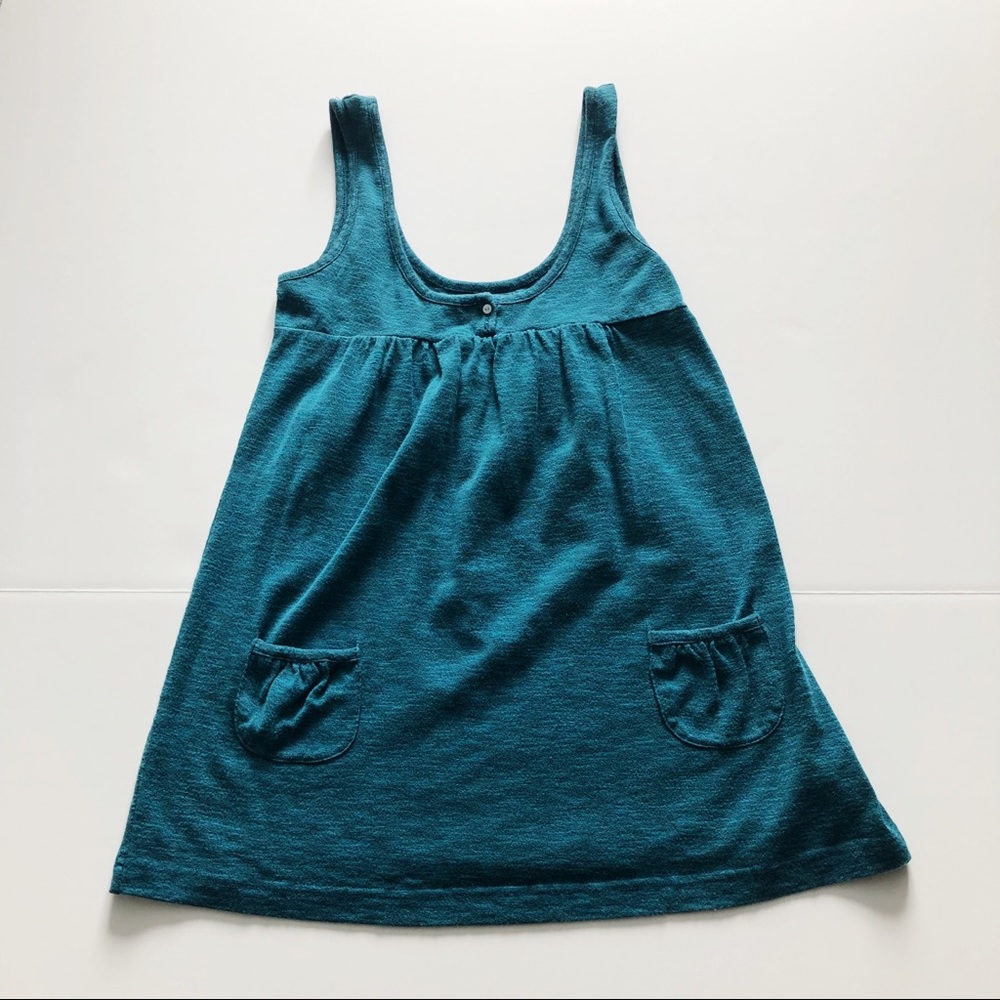 Teal blue tank top with pocket detail. Size L